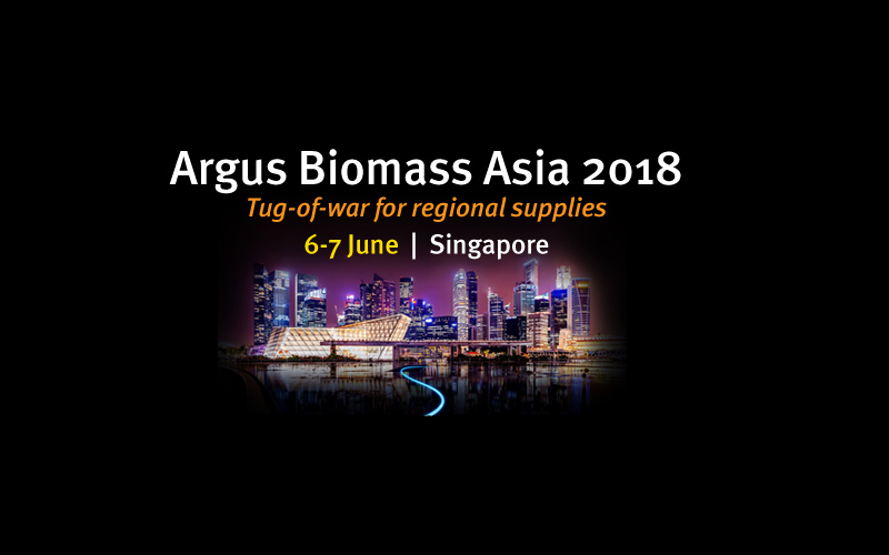 Singapore skyline by night with event title in text