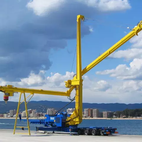 Yellow Siwertell mobile unloader by the harbor