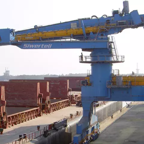 Blue Siwertell Ship unloader in operation