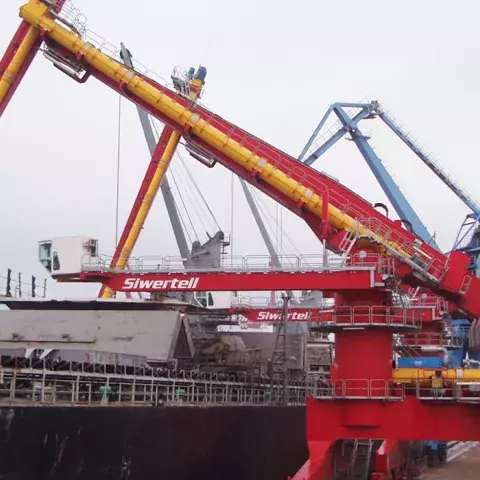 Red Siwertell Ship unloader in operation