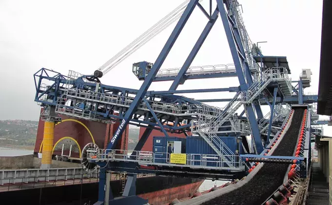 Blue Siwertell ship loader in operation