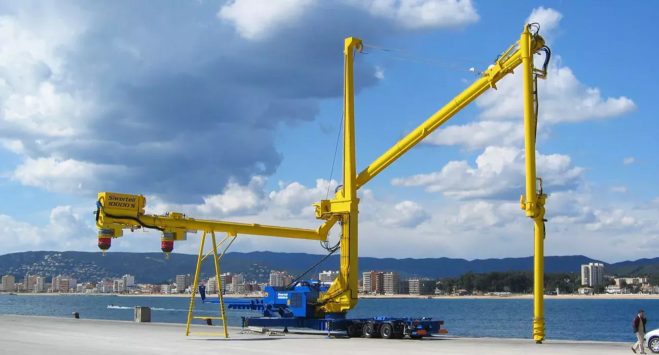 Yellow Siwertell mobile unloader by the harbor